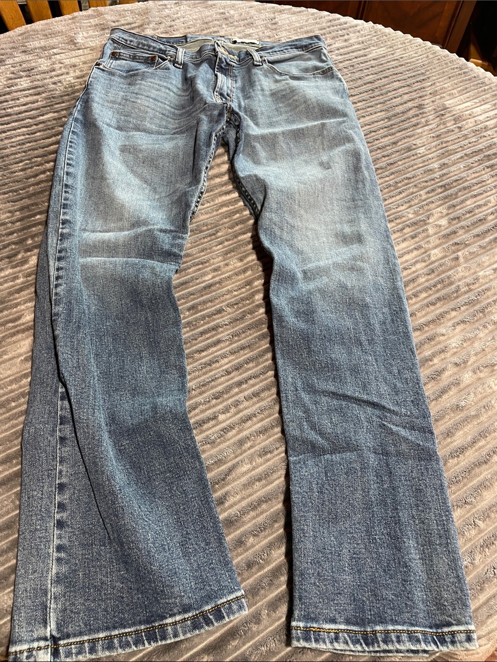Wrangler Slim Straight Blue Jeans with Gold Stitching